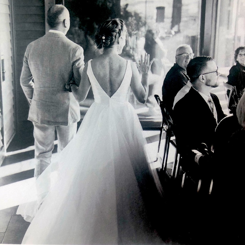 Gorgeous deep v neck and back tulle skirt wedding gown. Size 4